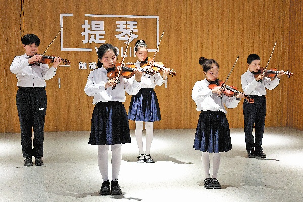 Strings of violin drown out memories of gunfire in rural China