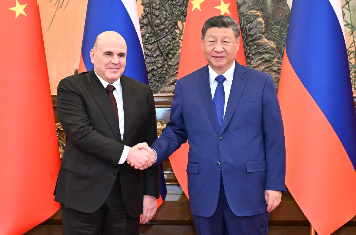 Xi meets Russian PM in Beijing