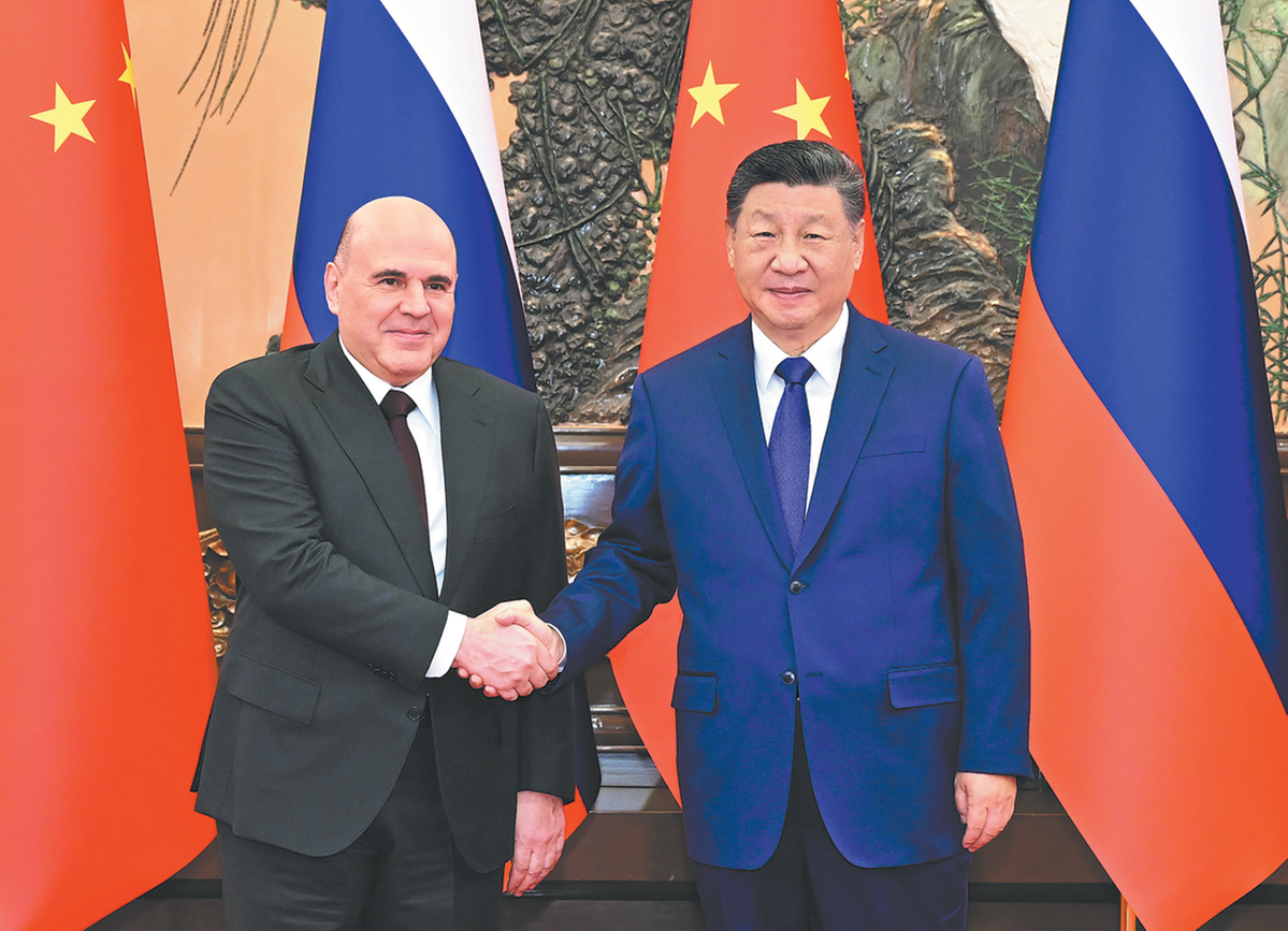 Xi calls for better synergy with Russia Xi calls for better synergy with Russia