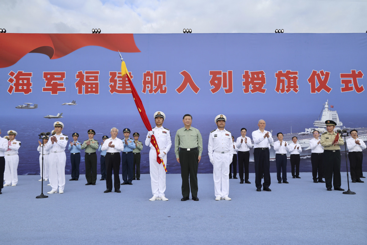 Xi attends commissioning of China's Fujian aircraft carrier in South China