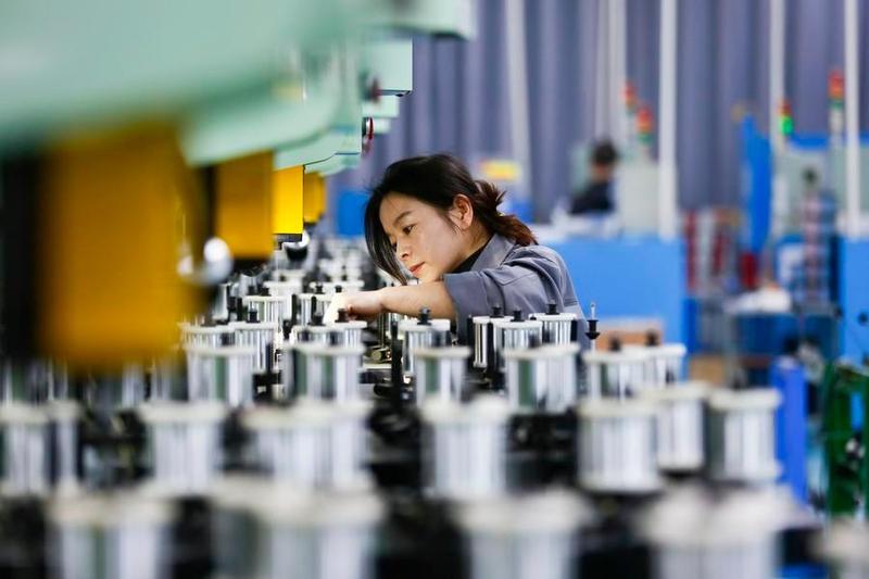 China's manufacturing PMI expands to 50.4 in March