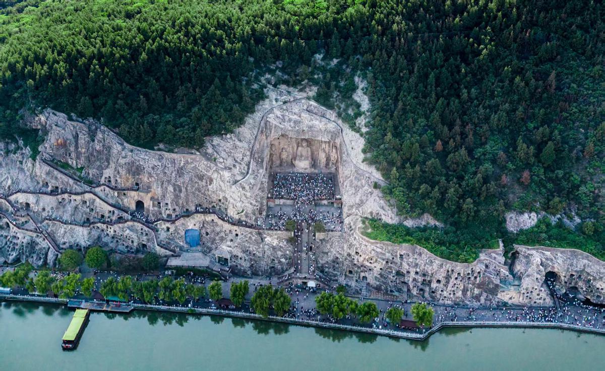 Longmen Grottoes symposium discusses preservation in Luoyang