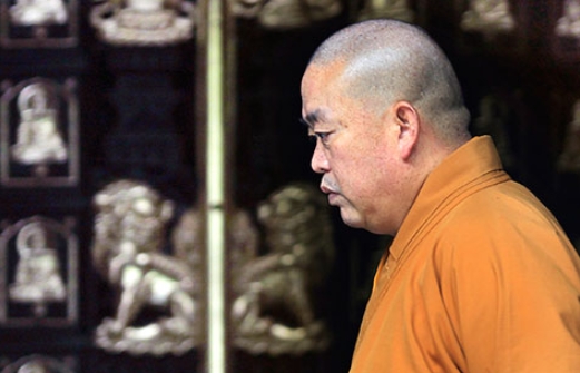 Shaolin ex-abbot gets 24 years for embezzlement