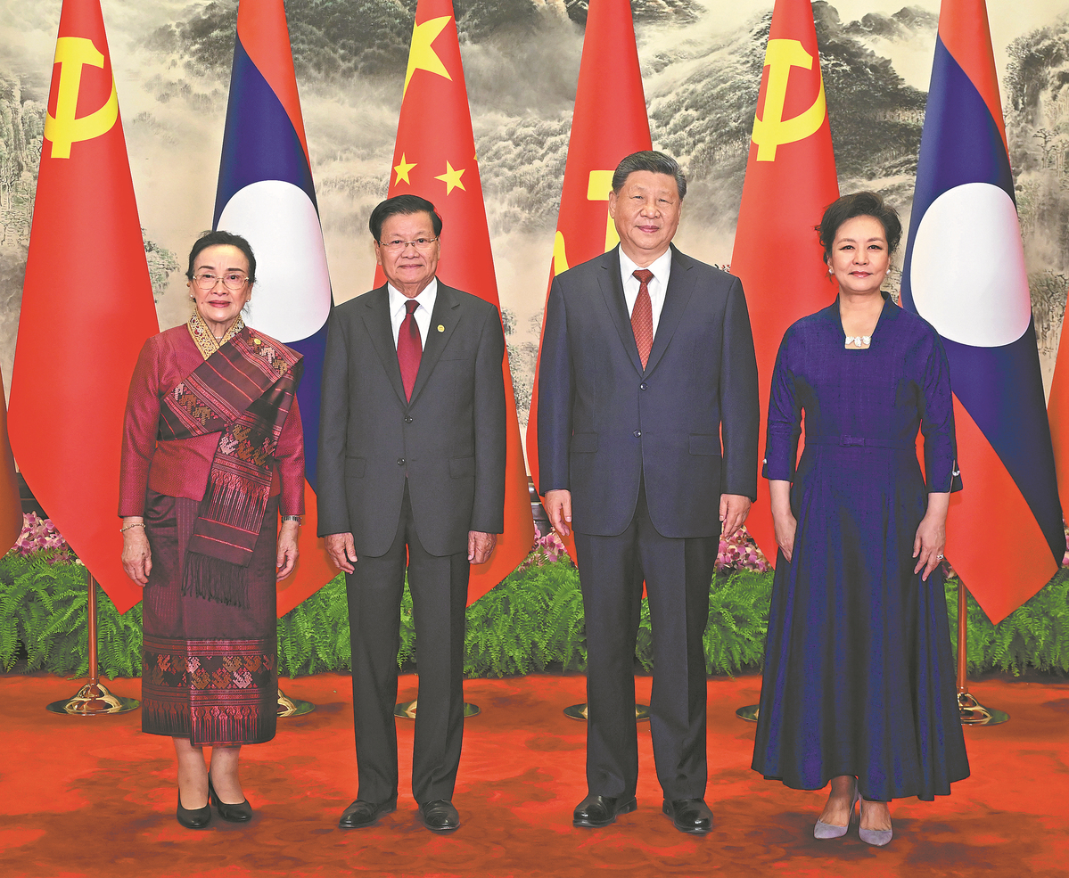 Xi calls for advancing China-Laos ties
