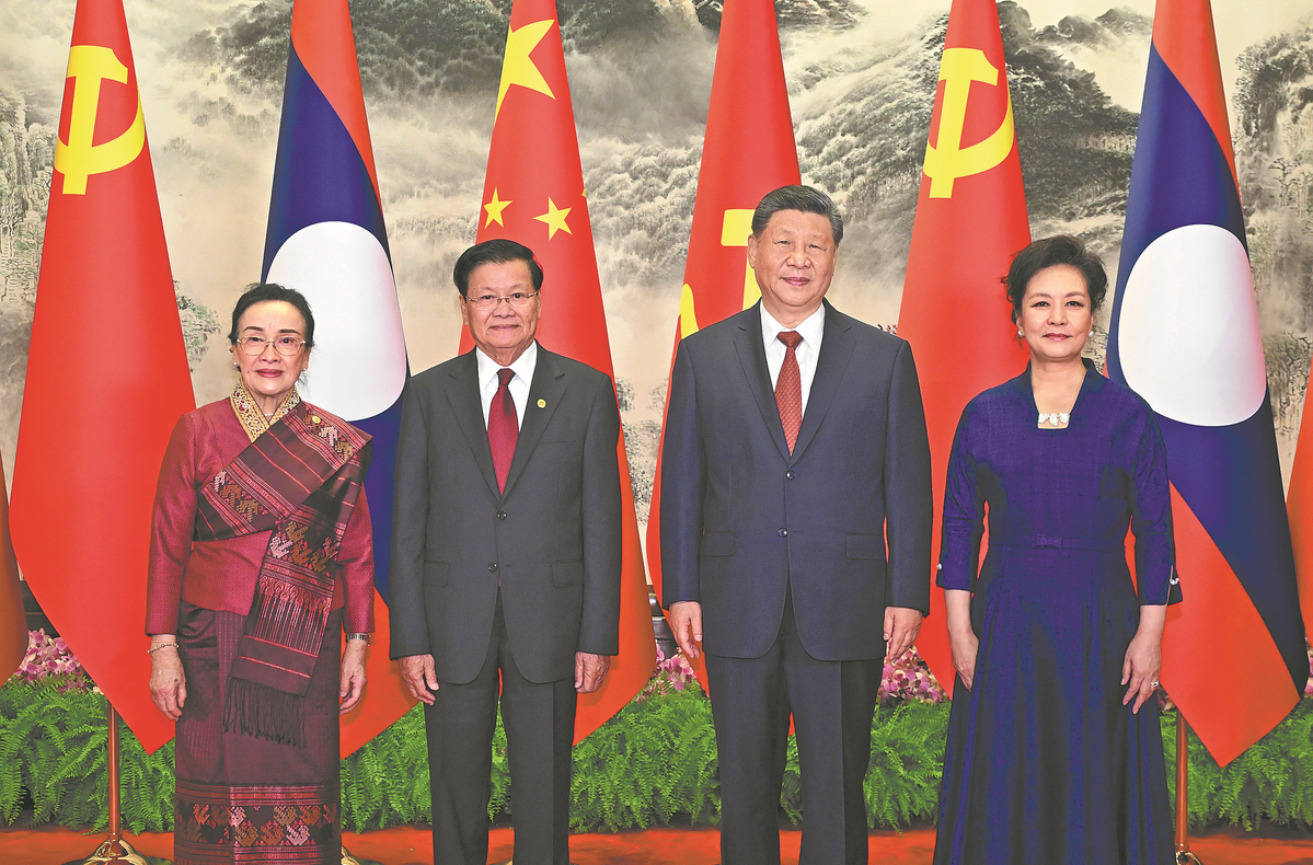 Xi calls for advancing China-Laos ties