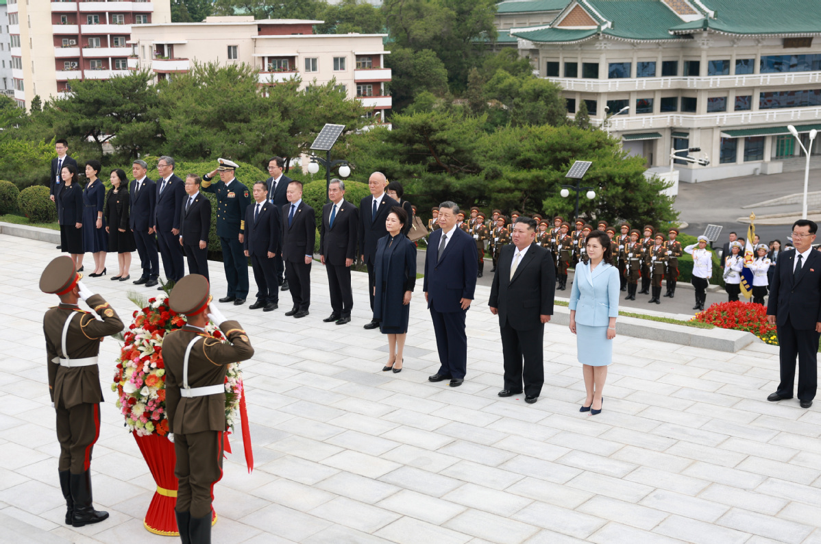 Xi, Kim pledge to carry forward great traditional China-DPRK friendship through generations