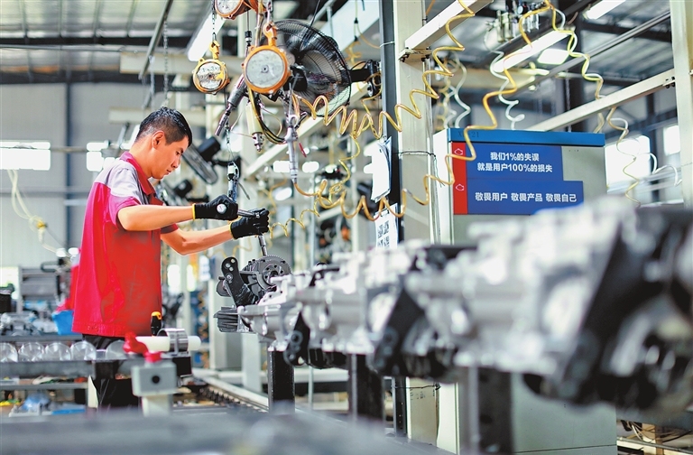 Auto parts plant runs at full speed to meet orders