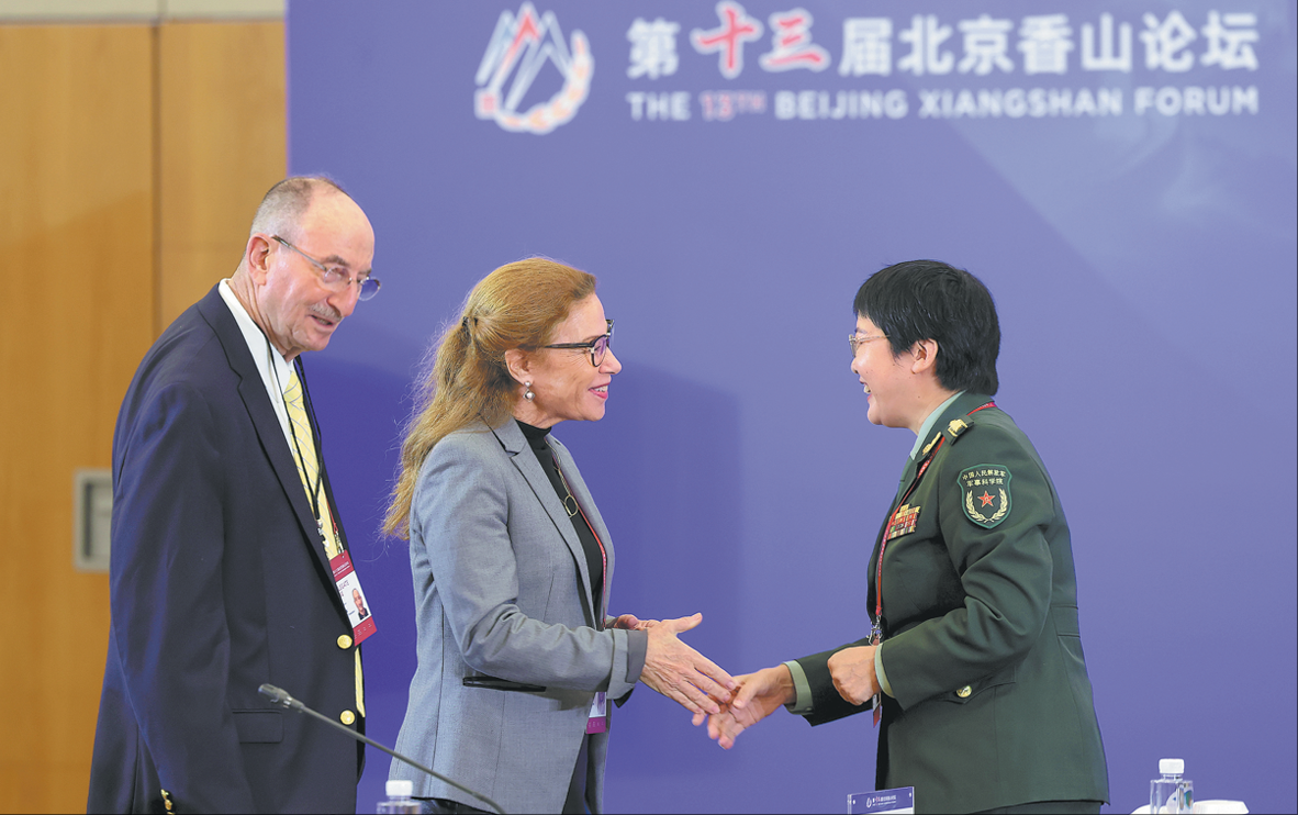 China urges joint efforts to address security challenges as int'l forum closes